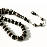 Black Kawk, adorned with metal and stones, 10 mm, 33 beads