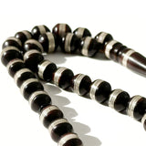 Black Kawk, adorned with metal and stones, 10 mm, 33 beads