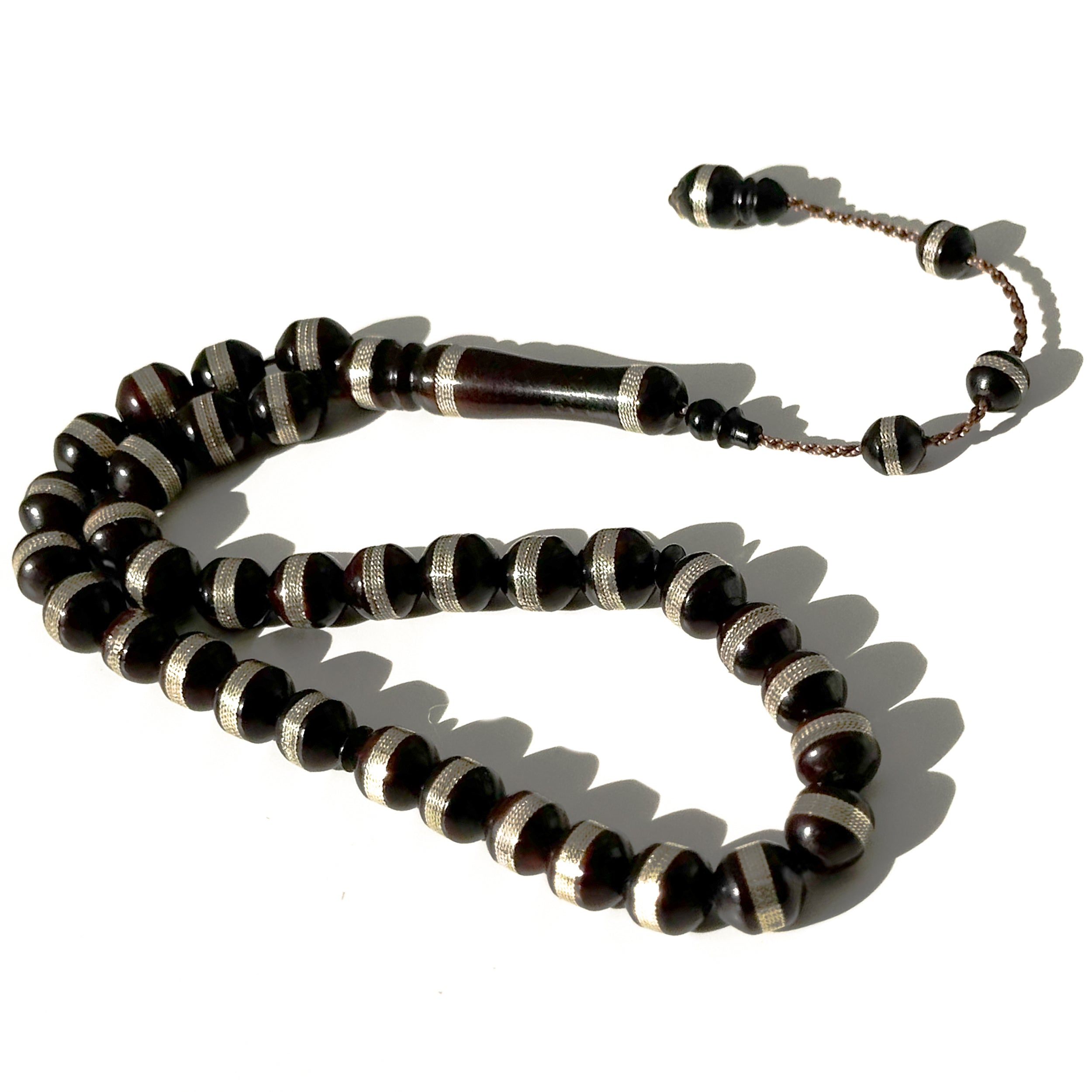 Black Kawk, adorned with metal and stones, 10 mm, 33 beads
